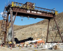 Motor-driven cable reel, cable festoon, and TrenchGuard systems power a large gantry crane.